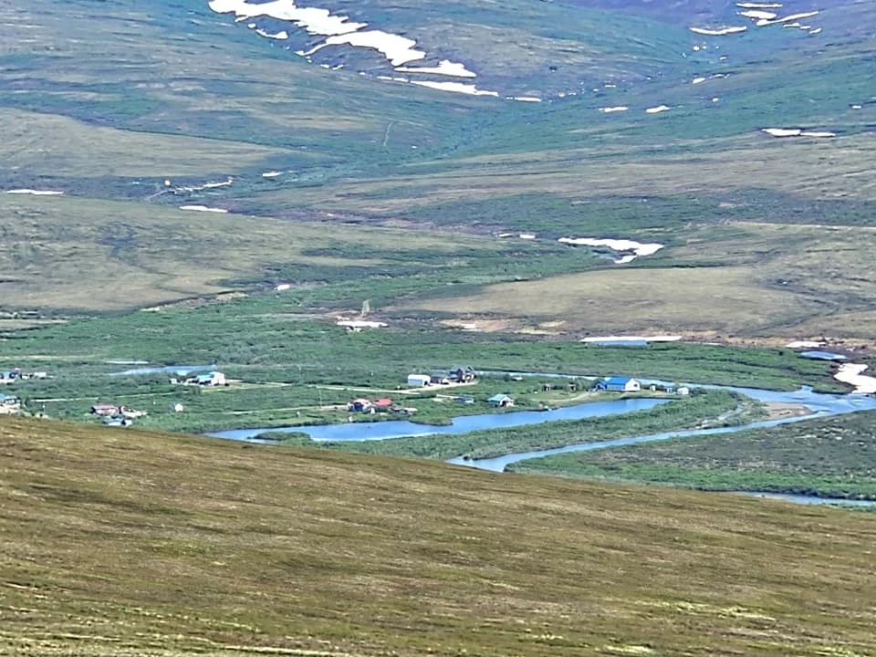 Discovering Newton Peak Hike in Nome, Alaska: A Comprehensive Adventure Guide 65 Cruising with Danny and Peter, Holland America Line, Westerdam, Nome, Alaska, United States | Scenic images of the Newton Peak Hike in Nome, Alaska, including the trailhead marking the start of the adventure, hikers ascending the challenging terrain, panoramic summit views of rolling hills and the Bering Sea, wildlife like curious squirrels and soaring birds along the trail, and vibrant wildflowers adding color to the rugged landscape.
