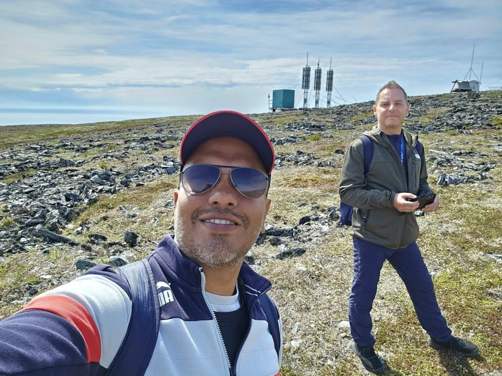 Discovering Newton Peak Hike in Nome, Alaska: A Comprehensive Adventure Guide 6 Cruising with Danny and Peter, Holland America Line, Westerdam, Nome, Alaska, United States | Scenic images of the Newton Peak Hike in Nome, Alaska, including the trailhead marking the start of the adventure, hikers ascending the challenging terrain, panoramic summit views of rolling hills and the Bering Sea, wildlife like curious squirrels and soaring birds along the trail, and vibrant wildflowers adding color to the rugged landscape.