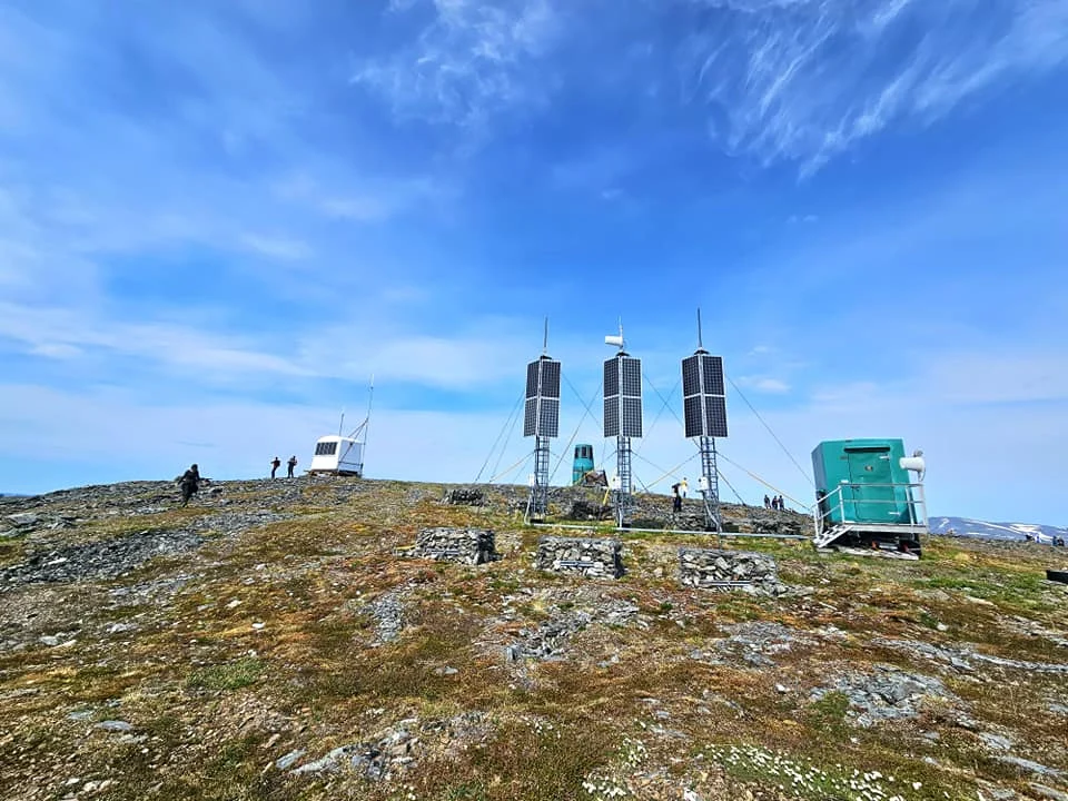 Discovering Newton Peak Hike in Nome, Alaska: A Comprehensive Adventure Guide 76 Cruising with Danny and Peter, Holland America Line, Westerdam, Nome, Alaska, United States | Scenic images of the Newton Peak Hike in Nome, Alaska, including the trailhead marking the start of the adventure, hikers ascending the challenging terrain, panoramic summit views of rolling hills and the Bering Sea, wildlife like curious squirrels and soaring birds along the trail, and vibrant wildflowers adding color to the rugged landscape.