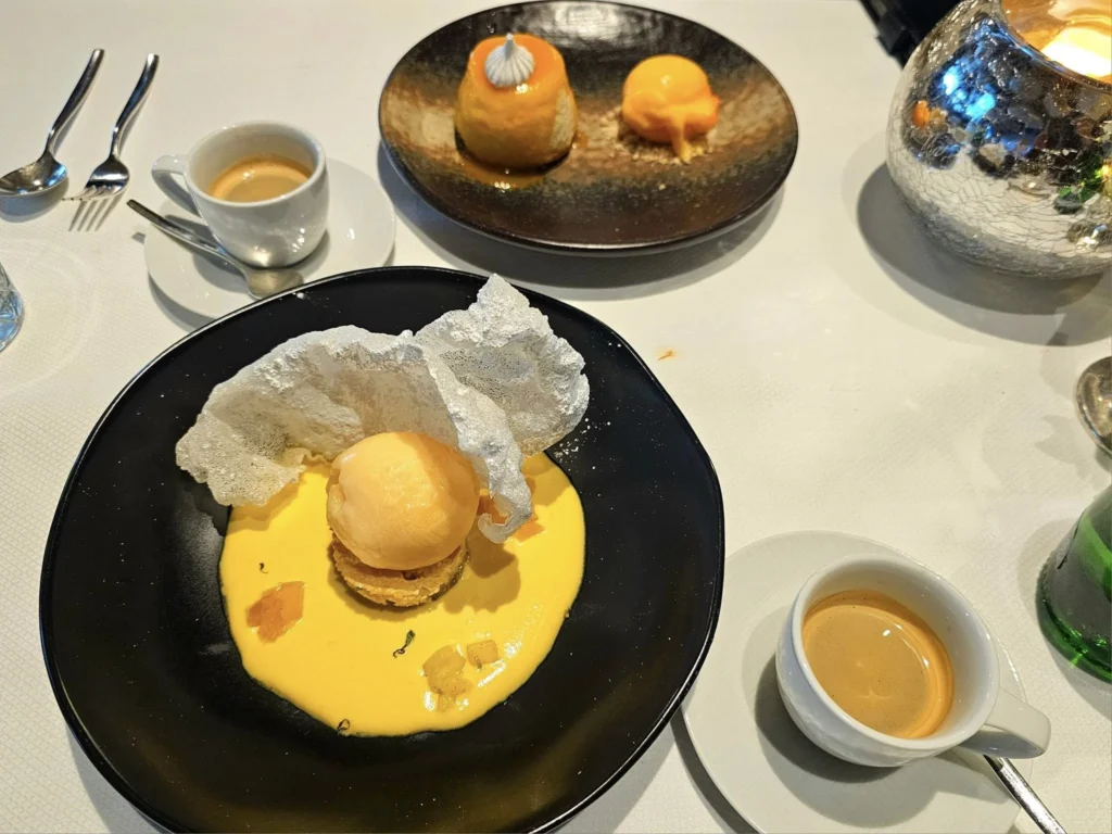 Cruising with Danny and Peter, Holland America Line, Westerdam, Kodiak, Alaska, United States | Explore Fort Abercrombie State Historical Park in Kodiak, Alaska, with views of WWII coastal defense remnants, the Observation Tower, and scenic Piedmont Point. Experience an exquisite dinner at Tamarind in the Pinnacle Grill aboard an Alaska Arctic Circle Solstice cruise, featuring Asian-inspired cuisine.