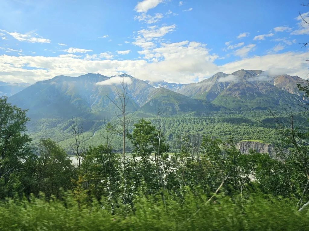 Cruising with Danny and Peter, Holland America Line, Westerdam, Anchorage, Alaska, United States | Experience the Matanuska Glacier Tour with stunning views of the glacier’s vast ice formations, an all-terrain vehicle ride, thrilling glacier hikes, and the unique refreshment of drinking crystal-clear glacial water, all complemented by stops at charming local eateries offering authentic Alaskan cuisine.