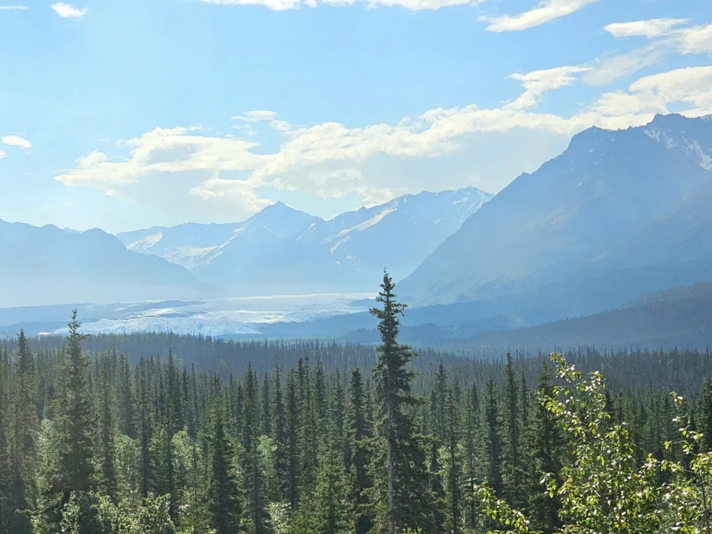 Cruising with Danny and Peter, Holland America Line, Westerdam, Anchorage, Alaska, United States | Experience the Matanuska Glacier Tour with stunning views of the glacier’s vast ice formations, an all-terrain vehicle ride, thrilling glacier hikes, and the unique refreshment of drinking crystal-clear glacial water, all complemented by stops at charming local eateries offering authentic Alaskan cuisine.