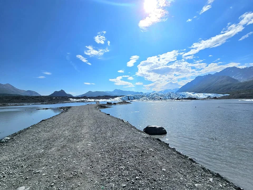 Cruising with Danny and Peter, Holland America Line, Westerdam, Anchorage, Alaska, United States | Experience the Matanuska Glacier Tour with stunning views of the glacier’s vast ice formations, an all-terrain vehicle ride, thrilling glacier hikes, and the unique refreshment of drinking crystal-clear glacial water, all complemented by stops at charming local eateries offering authentic Alaskan cuisine.