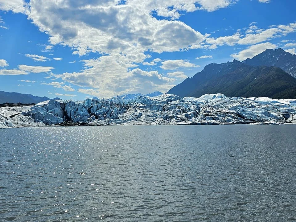 Cruising with Danny and Peter, Holland America Line, Westerdam, Anchorage, Alaska, United States | Experience the Matanuska Glacier Tour with stunning views of the glacier’s vast ice formations, an all-terrain vehicle ride, thrilling glacier hikes, and the unique refreshment of drinking crystal-clear glacial water, all complemented by stops at charming local eateries offering authentic Alaskan cuisine.