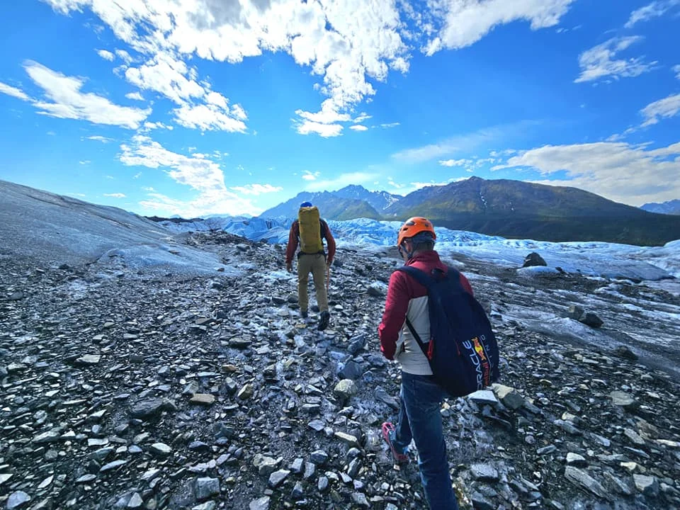 Cruising with Danny and Peter, Holland America Line, Westerdam, Anchorage, Alaska, United States | Experience the Matanuska Glacier Tour with stunning views of the glacier’s vast ice formations, an all-terrain vehicle ride, thrilling glacier hikes, and the unique refreshment of drinking crystal-clear glacial water, all complemented by stops at charming local eateries offering authentic Alaskan cuisine.