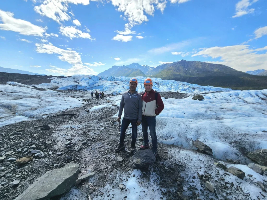 Cruising with Danny and Peter, Holland America Line, Westerdam, Anchorage, Alaska, United States | Experience the Matanuska Glacier Tour with stunning views of the glacier’s vast ice formations, an all-terrain vehicle ride, thrilling glacier hikes, and the unique refreshment of drinking crystal-clear glacial water, all complemented by stops at charming local eateries offering authentic Alaskan cuisine.