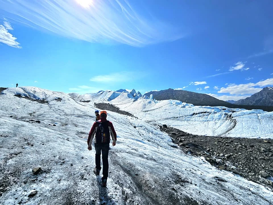 Cruising with Danny and Peter, Holland America Line, Westerdam, Anchorage, Alaska, United States | Experience the Matanuska Glacier Tour with stunning views of the glacier’s vast ice formations, an all-terrain vehicle ride, thrilling glacier hikes, and the unique refreshment of drinking crystal-clear glacial water, all complemented by stops at charming local eateries offering authentic Alaskan cuisine.
