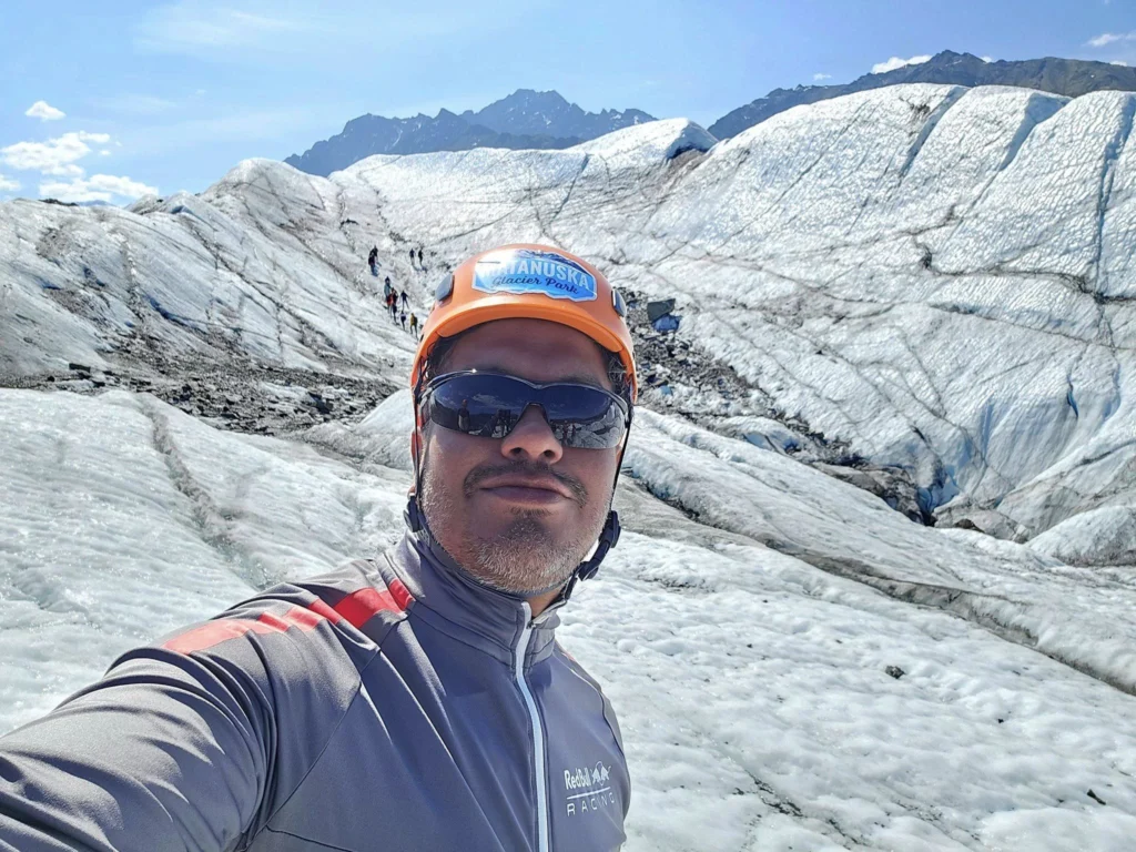 Cruising with Danny and Peter, Holland America Line, Westerdam, Anchorage, Alaska, United States | Experience the Matanuska Glacier Tour with stunning views of the glacier’s vast ice formations, an all-terrain vehicle ride, thrilling glacier hikes, and the unique refreshment of drinking crystal-clear glacial water, all complemented by stops at charming local eateries offering authentic Alaskan cuisine.