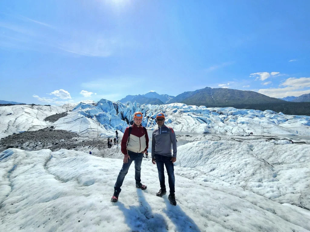 Cruising with Danny and Peter, Holland America Line, Westerdam, Anchorage, Alaska, United States | Experience the Matanuska Glacier Tour with stunning views of the glacier’s vast ice formations, an all-terrain vehicle ride, thrilling glacier hikes, and the unique refreshment of drinking crystal-clear glacial water, all complemented by stops at charming local eateries offering authentic Alaskan cuisine.