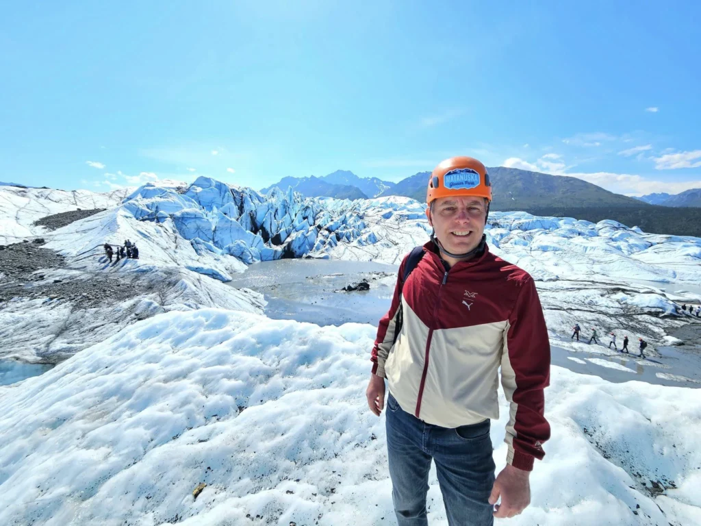 Cruising with Danny and Peter, Holland America Line, Westerdam, Anchorage, Alaska, United States | Experience the Matanuska Glacier Tour with stunning views of the glacier’s vast ice formations, an all-terrain vehicle ride, thrilling glacier hikes, and the unique refreshment of drinking crystal-clear glacial water, all complemented by stops at charming local eateries offering authentic Alaskan cuisine.