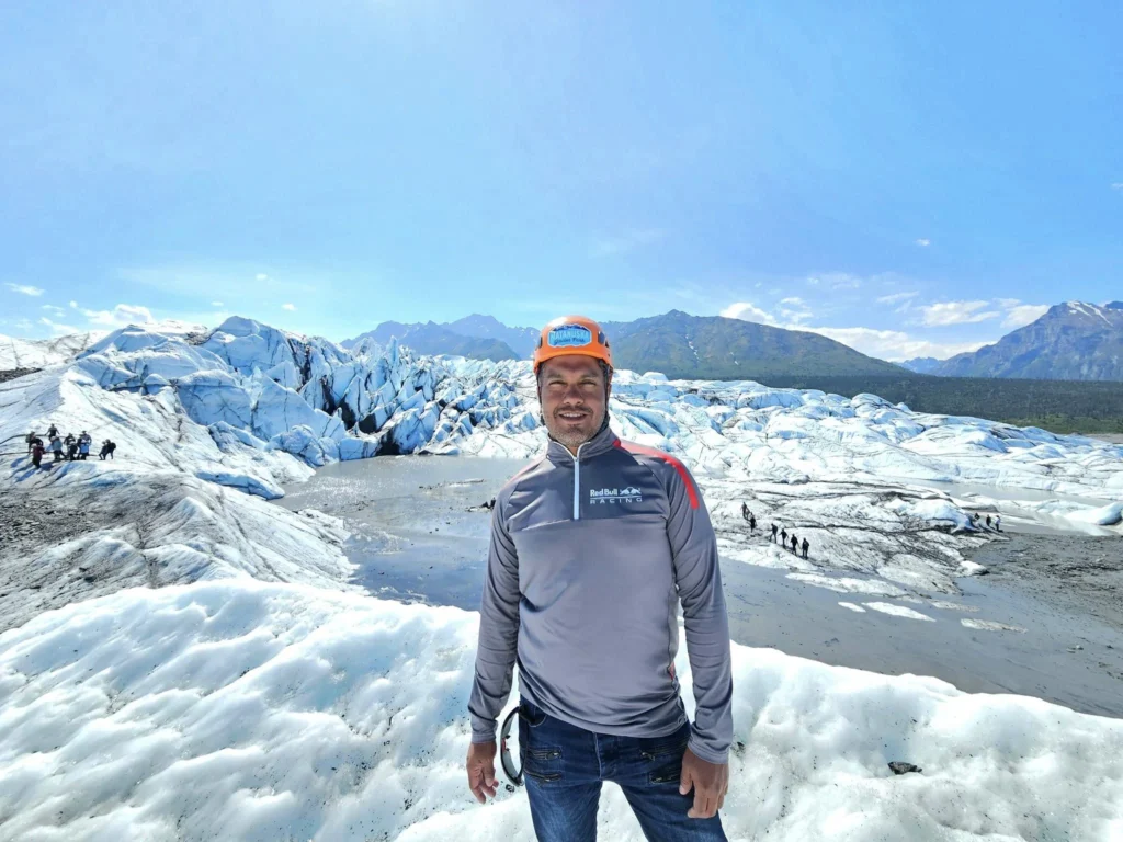 Cruising with Danny and Peter, Holland America Line, Westerdam, Anchorage, Alaska, United States | Experience the Matanuska Glacier Tour with stunning views of the glacier’s vast ice formations, an all-terrain vehicle ride, thrilling glacier hikes, and the unique refreshment of drinking crystal-clear glacial water, all complemented by stops at charming local eateries offering authentic Alaskan cuisine.