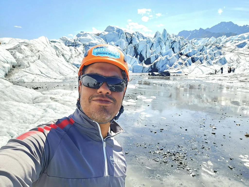 Cruising with Danny and Peter, Holland America Line, Westerdam, Anchorage, Alaska, United States | Experience the Matanuska Glacier Tour with stunning views of the glacier’s vast ice formations, an all-terrain vehicle ride, thrilling glacier hikes, and the unique refreshment of drinking crystal-clear glacial water, all complemented by stops at charming local eateries offering authentic Alaskan cuisine.