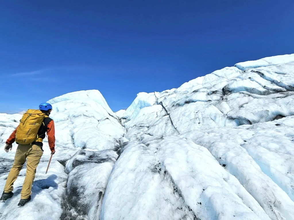 Cruising with Danny and Peter, Holland America Line, Westerdam, Anchorage, Alaska, United States | Experience the Matanuska Glacier Tour with stunning views of the glacier’s vast ice formations, an all-terrain vehicle ride, thrilling glacier hikes, and the unique refreshment of drinking crystal-clear glacial water, all complemented by stops at charming local eateries offering authentic Alaskan cuisine.