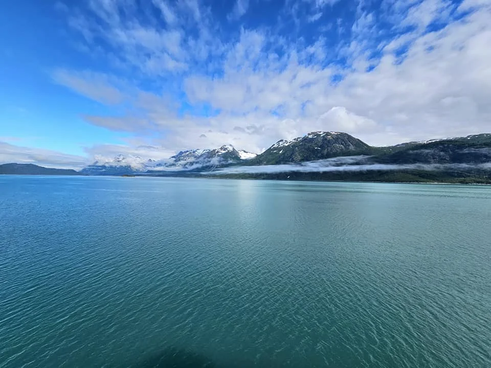 Cruising with Danny and Peter, Holland America Line, Westerdam, Glacier Bay, Alaska, United States | Westerdam cruise ship sailing through Glacier Bay on the Alaska Arctic Circle Solstice Cruise, showcasing stunning glaciers, snow-capped mountains, and diverse wildlife.