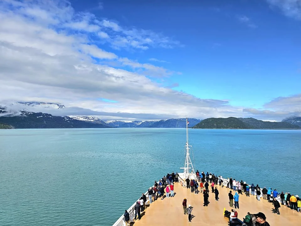 Cruising with Danny and Peter, Holland America Line, Westerdam, Glacier Bay, Alaska, United States | Westerdam cruise ship sailing through Glacier Bay on the Alaska Arctic Circle Solstice Cruise, showcasing stunning glaciers, snow-capped mountains, and diverse wildlife.