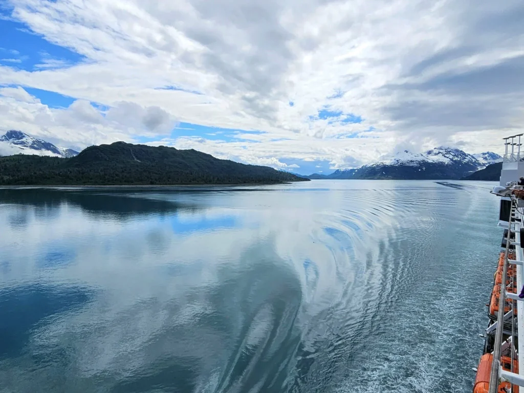 Cruising with Danny and Peter, Holland America Line, Westerdam, Glacier Bay, Alaska, United States | Westerdam cruise ship sailing through Glacier Bay on the Alaska Arctic Circle Solstice Cruise, showcasing stunning glaciers, snow-capped mountains, and diverse wildlife.