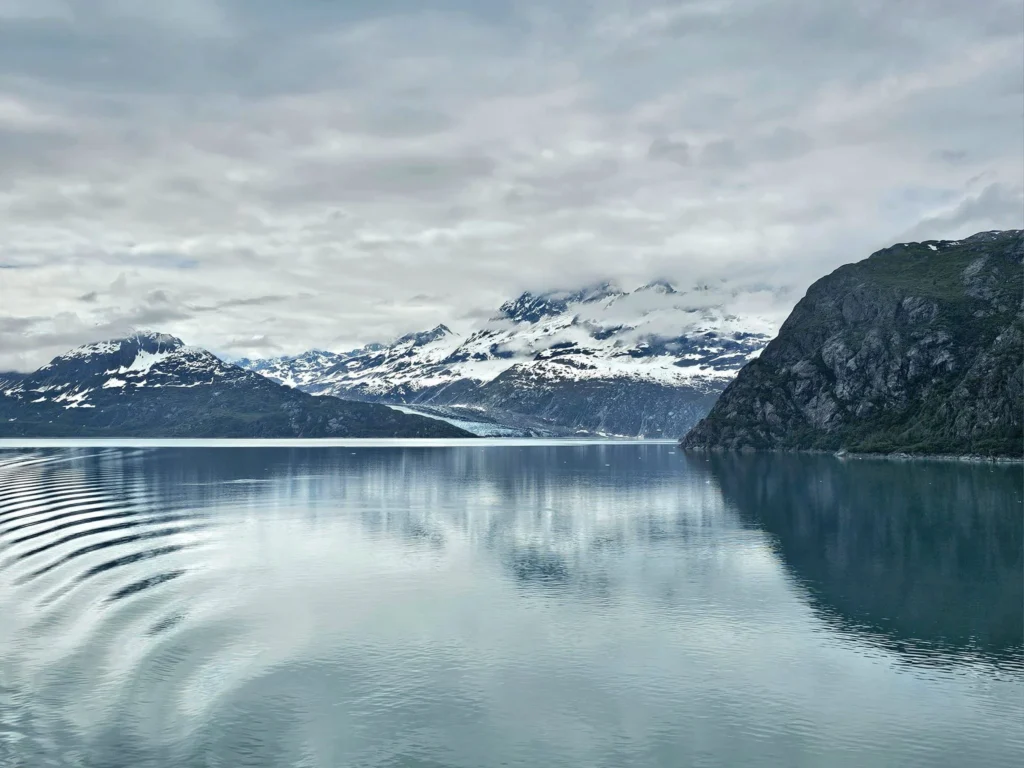 Cruising with Danny and Peter, Holland America Line, Westerdam, Glacier Bay, Alaska, United States | Westerdam cruise ship sailing through Glacier Bay on the Alaska Arctic Circle Solstice Cruise, showcasing stunning glaciers, snow-capped mountains, and diverse wildlife.