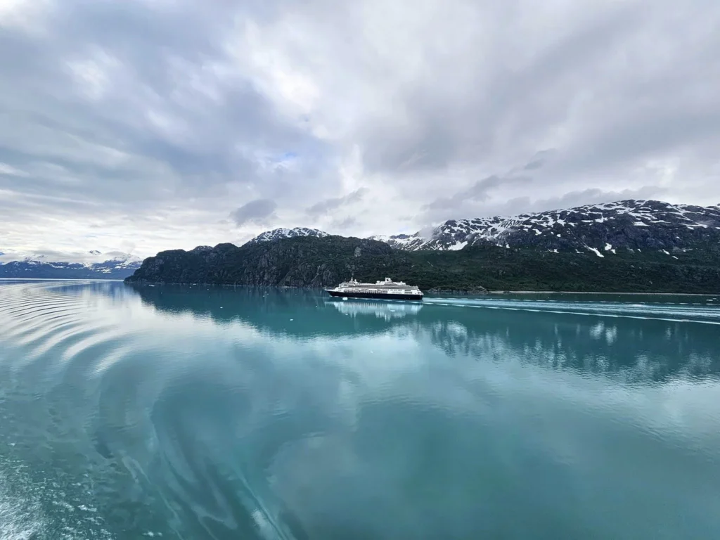 Cruising with Danny and Peter, Holland America Line, Westerdam, Glacier Bay, Alaska, United States | Westerdam cruise ship sailing through Glacier Bay on the Alaska Arctic Circle Solstice Cruise, showcasing stunning glaciers, snow-capped mountains, and diverse wildlife.