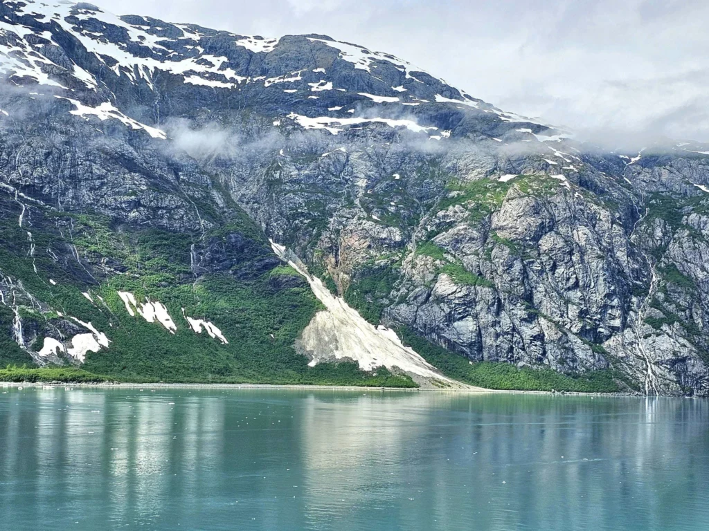 Cruising with Danny and Peter, Holland America Line, Westerdam, Glacier Bay, Alaska, United States | Westerdam cruise ship sailing through Glacier Bay on the Alaska Arctic Circle Solstice Cruise, showcasing stunning glaciers, snow-capped mountains, and diverse wildlife.