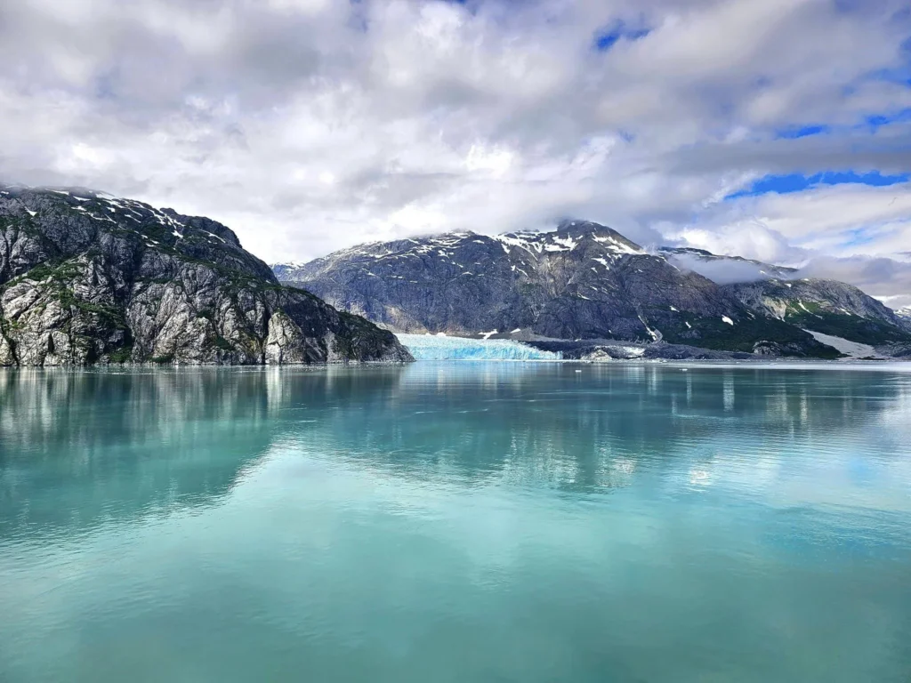 Cruising with Danny and Peter, Holland America Line, Westerdam, Glacier Bay, Alaska, United States | Westerdam cruise ship sailing through Glacier Bay on the Alaska Arctic Circle Solstice Cruise, showcasing stunning glaciers, snow-capped mountains, and diverse wildlife.