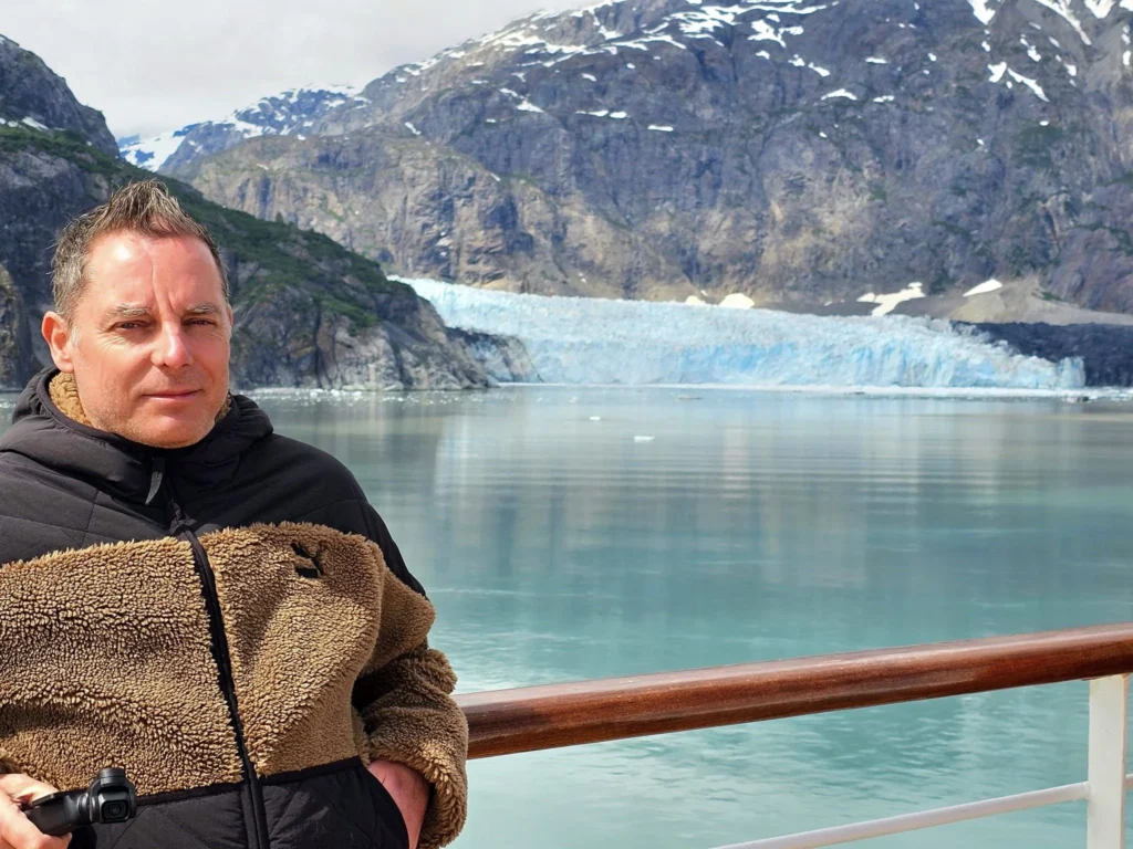 Cruising with Danny and Peter, Holland America Line, Westerdam, Glacier Bay, Alaska, United States | Westerdam cruise ship sailing through Glacier Bay on the Alaska Arctic Circle Solstice Cruise, showcasing stunning glaciers, snow-capped mountains, and diverse wildlife.