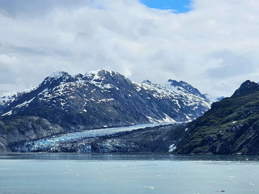 Cruising with Danny and Peter, Holland America Line, Westerdam, Glacier Bay, Alaska, United States | Westerdam cruise ship sailing through Glacier Bay on the Alaska Arctic Circle Solstice Cruise, showcasing stunning glaciers, snow-capped mountains, and diverse wildlife.