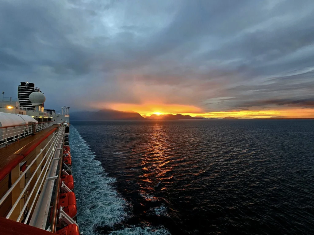 Cruising with Danny and Peter, Holland America Line, Westerdam, Glacier Bay, Alaska, United States | Westerdam cruise ship sailing through Glacier Bay on the Alaska Arctic Circle Solstice Cruise, showcasing stunning glaciers, snow-capped mountains, and diverse wildlife.