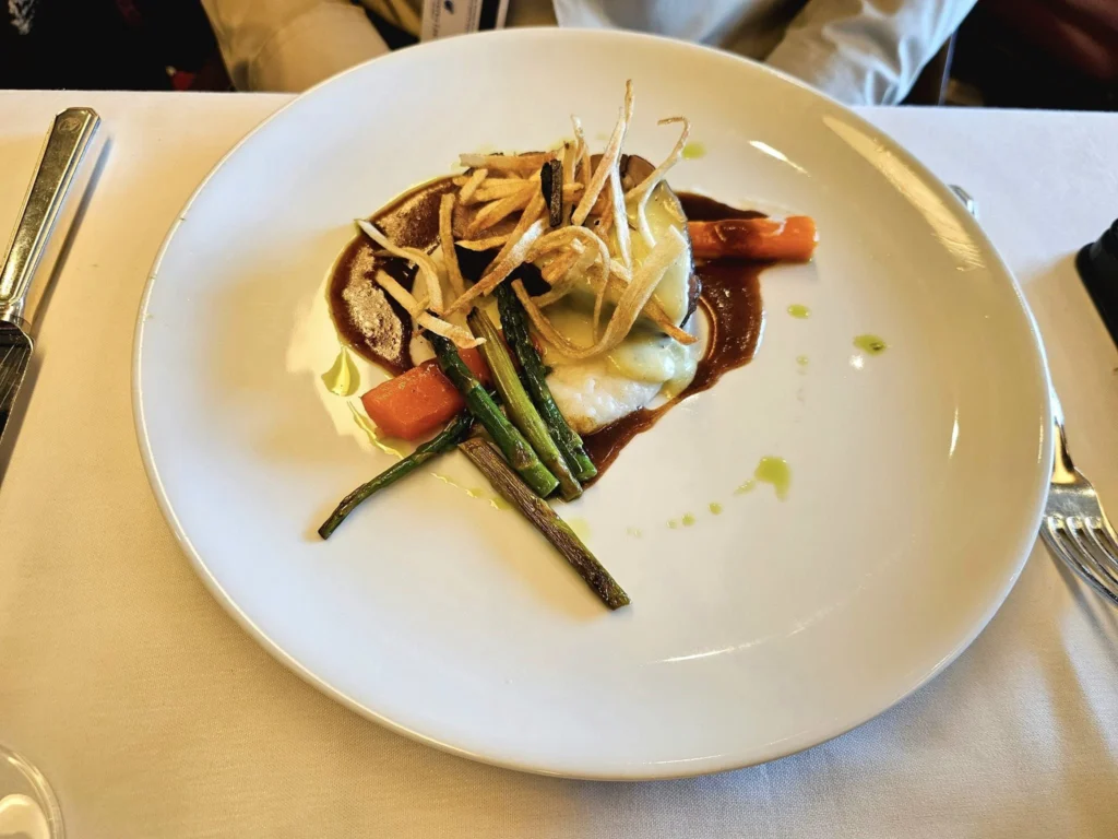 Cruising with Danny and Peter, Holland America Line, Westerdam, Sea Day, Tracy Arm, Alaska, United States | Elegant dining setup at the Mariners Lunch aboard the Holland America Westerdam Alaska cruise, showcasing luxury cruise dining and stunning sea views.