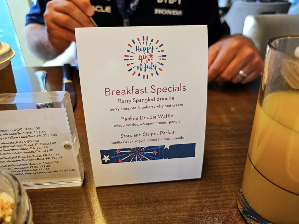 Cruising with Danny and Peter, Holland America Line, Westerdam, Misty Fjords, Alaska, United States | Passengers aboard the Holland America Line's Westerdam transition to the smaller Wilderness Explorer vessel for the Misty Fjords & Wilderness Explorer tour, offering breathtaking views of Misty Fjords National Monument, stunning waterfalls, and diverse wildlife including seals and eagles, all part of the unforgettable Alaska Arctic Circle cruise experience.