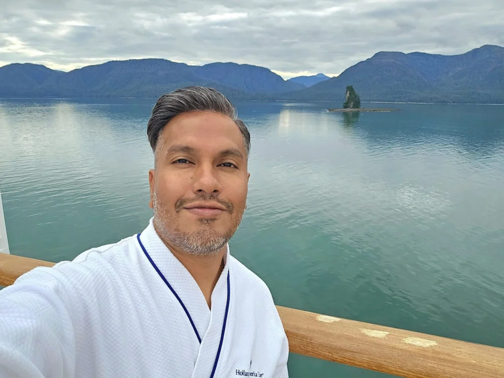 Cruising with Danny and Peter, Holland America Line, Westerdam, Misty Fjords, Alaska, United States | Passengers aboard the Holland America Line's Westerdam transition to the smaller Wilderness Explorer vessel for the Misty Fjords & Wilderness Explorer tour, offering breathtaking views of Misty Fjords National Monument, stunning waterfalls, and diverse wildlife including seals and eagles, all part of the unforgettable Alaska Arctic Circle cruise experience.