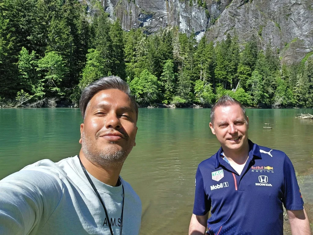 Cruising with Danny and Peter, Holland America Line, Westerdam, Prince Rupert, British Columbia, Canada | In the heart of British Columbia’s wild embrace, Where the Great Bear Rainforest weaves its mystic lace, A journey unfolds, both rail and road in stride, Through nature’s grandeur, where dreams and landscapes collide. From Prince Rupert’s charm, the train departs with grace, A serpentine path through forests’ ancient face, Panoramic windows frame a living, verdant dream, As the Skeena River’s flow whispers its serene theme. Mountains rise like giants, draped in emerald hues, While bald eagles soar, their shadows fleeting views, Black bears wander softly through the forest deep, And mountain goats on rugged cliffs silently leap. Kleanza Creek’s waterfalls cascade with a roar, Nature’s symphony on the rainforest’s floor, And Exchamsiks Park, a jewel of glacial light, Where shimmering pools reflect the day’s pure delight. From rail to road, the scenic drive unveils, A tapestry of mountains and verdant trails, Each turn a canvas painted with the wild’s own hand, A journey through a wonderland, vast and grand. Back in Prince Rupert, where history finds its place, The Museum’s treasures weave a cultural grace, Totem poles and masks tell tales of ancient lore, In this land where the past and present gently soar. Through the Great Bear Rainforest, we wandered wide, In rail and road’s embrace, where nature and culture collide, A journey of wonder, where memories are spun, In the heart of British Columbia, under the sun.