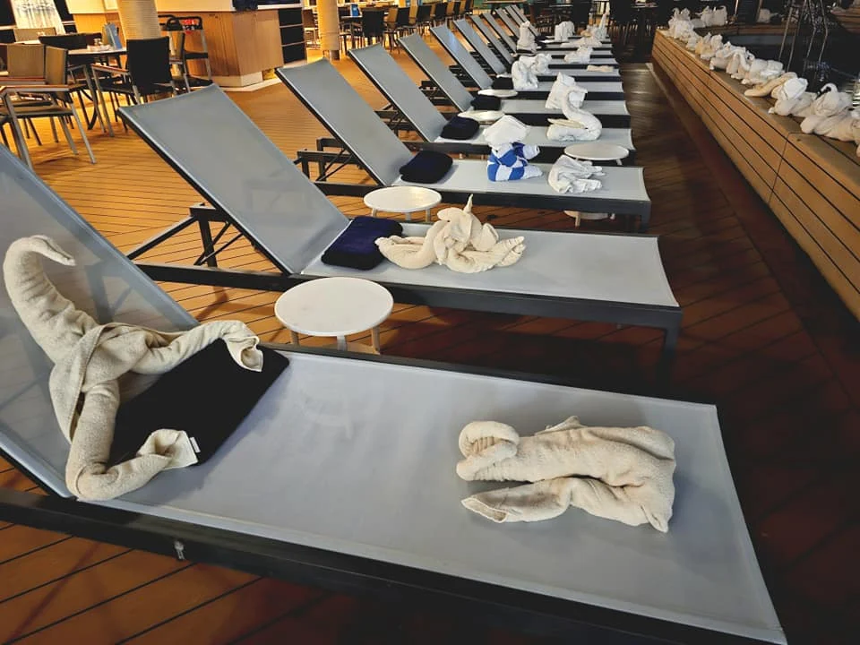 Cruising with Danny and Peter, Holland America Line, Westerdam, Seattle, Washington, United States | Stunning sunset over the ocean during a magical evening cruise from Prince Rupert on the Westerdam, with vibrant orange and pink skies reflecting on calm waters.