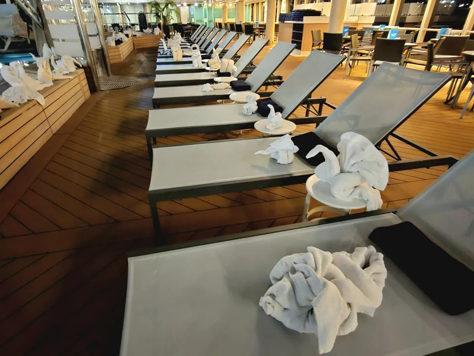 Cruising with Danny and Peter, Holland America Line, Westerdam, Seattle, Washington, United States | Stunning sunset over the ocean during a magical evening cruise from Prince Rupert on the Westerdam, with vibrant orange and pink skies reflecting on calm waters.