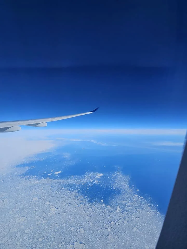 Cruising with Danny and Peter, Holland America Line, Westerdam, Seattle, Washington, United States | Aerial view of the MS Westerdam cruise ship sailing through Alaska’s stunning glaciers, showcasing the luxurious cruise experience and breathtaking scenery.