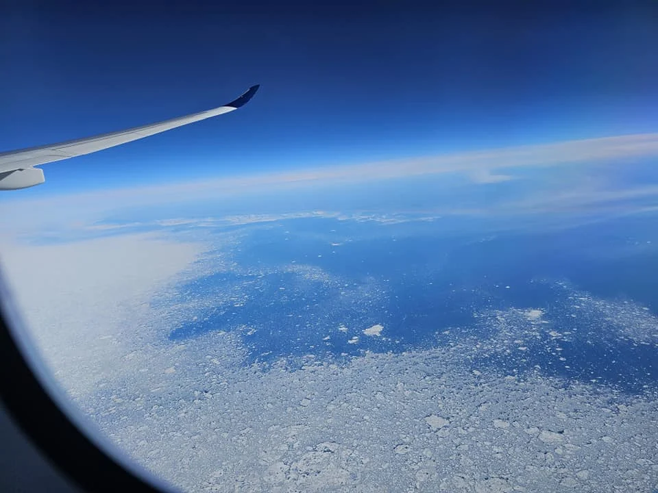 Cruising with Danny and Peter, Holland America Line, Westerdam, Seattle, Washington, United States | Aerial view of the MS Westerdam cruise ship sailing through Alaska’s stunning glaciers, showcasing the luxurious cruise experience and breathtaking scenery.