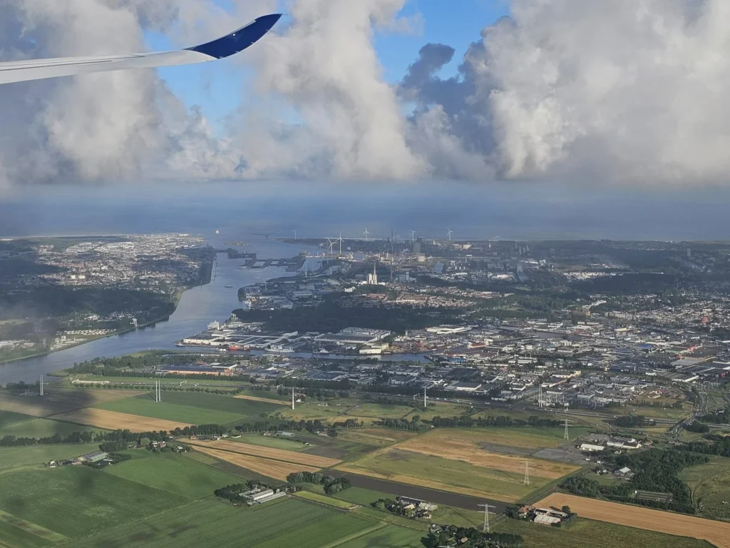 Cruising with Danny and Peter, Holland America Line, Westerdam, Seattle, Washington, United States | Aerial view of the MS Westerdam cruise ship sailing through Alaska’s stunning glaciers, showcasing the luxurious cruise experience and breathtaking scenery.