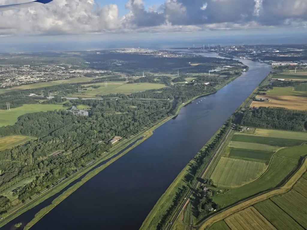 Cruising with Danny and Peter, Holland America Line, Westerdam, Seattle, Washington, United States | Aerial view of the MS Westerdam cruise ship sailing through Alaska’s stunning glaciers, showcasing the luxurious cruise experience and breathtaking scenery.