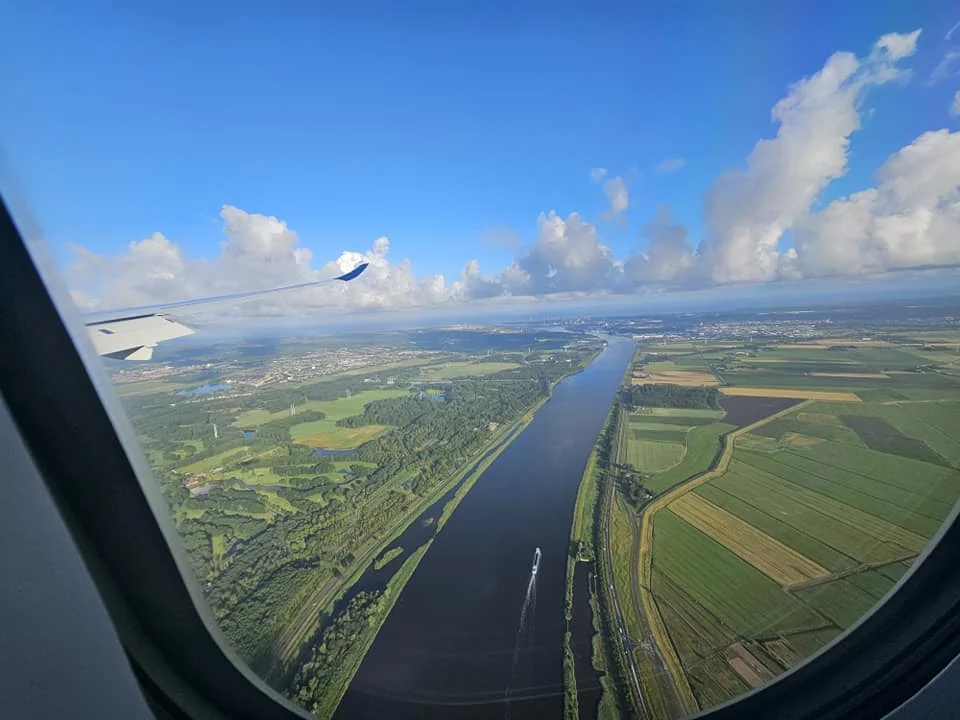 Cruising with Danny and Peter, Holland America Line, Westerdam, Seattle, Washington, United States | Aerial view of the MS Westerdam cruise ship sailing through Alaska’s stunning glaciers, showcasing the luxurious cruise experience and breathtaking scenery.