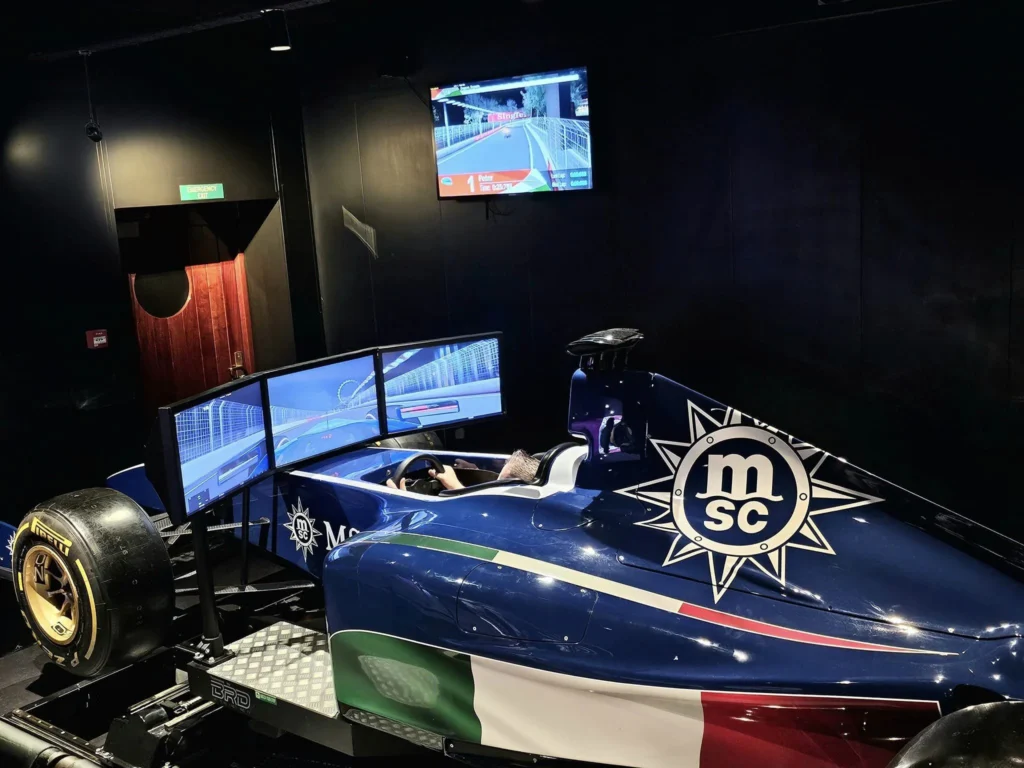 Cruising with Danny and Peter, MSC Cruises, MSC Preziosa, Rotterdam, The Netherlands, Birthday Cruise | The majestic MSC Preziosa cruise ship docked at Rotterdam’s Cruise Terminal on Wilhelminakade, its sleek white exterior gleaming against the modern city skyline with the iconic Erasmus Bridge in the background. Passengers board for a Northern Europe mini-cruise, celebrating a birthday with luxurious touches like a chilled bottle of Spumante and macarons in a stylish cabin. The vibrant onboard atmosphere features a gourmet dining experience at Butcher’s Cut Chef’s Table with a surprise birthday cake, thrilling entertainment at the Platinum Theater’s Rock Nation show with singers and dancers, and a lively Silent Disco in the Safari Lounge. The scene captures the excitement of embarkation day, with scenic views of Rotterdam’s waterfront, onboard shopping for MSC souvenirs, and the promise of an unforgettable luxury cruise vacation.