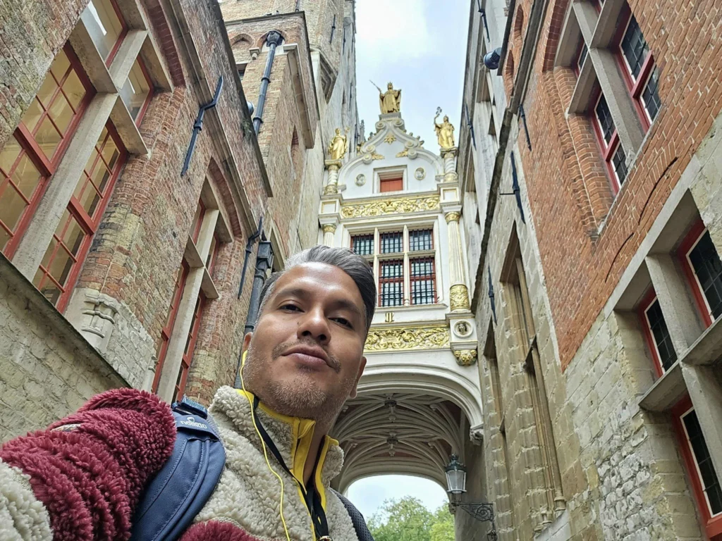 Cruising with Danny and Peter, MSC Cruises, MSC Preziosa, Zeebrugge, Brugge, Brussels, Belgium | Pictures from our Bruges day trip during the MSC Cruises Bruges excursion, showcasing the stunning Market Square Bruges, the iconic Belfry Tower Bruges, a scenic Belgium canal cruise, and beautiful views of the Chapel of the Holy Blood, along with delightful moments at the Butcher’s Cut restaurant and the MSC Voyagers Club event in the Safari Lounge MSC Preziosa.