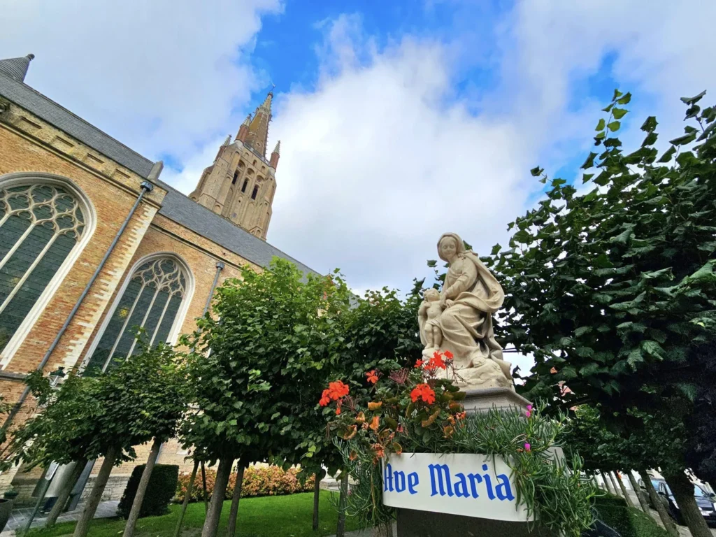 Cruising with Danny and Peter, MSC Cruises, MSC Preziosa, Zeebrugge, Brugge, Brussels, Belgium | Pictures from our Bruges day trip during the MSC Cruises Bruges excursion, showcasing the stunning Market Square Bruges, the iconic Belfry Tower Bruges, a scenic Belgium canal cruise, and beautiful views of the Chapel of the Holy Blood, along with delightful moments at the Butcher’s Cut restaurant and the MSC Voyagers Club event in the Safari Lounge MSC Preziosa.