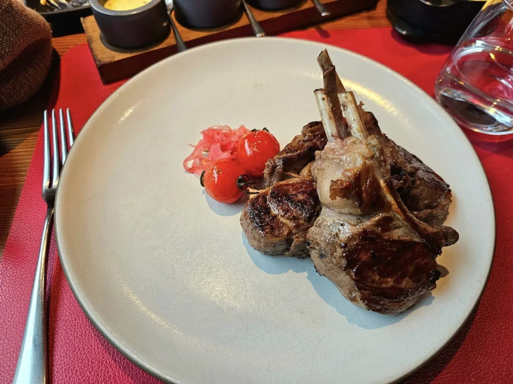 Cruising with Danny and Peter, MSC Cruises, MSC Preziosa, Zeebrugge, Brugge, Brussels, Belgium | Pictures from our Bruges day trip during the MSC Cruises Bruges excursion, showcasing the stunning Market Square Bruges, the iconic Belfry Tower Bruges, a scenic Belgium canal cruise, and beautiful views of the Chapel of the Holy Blood, along with delightful moments at the Butcher’s Cut restaurant and the MSC Voyagers Club event in the Safari Lounge MSC Preziosa.