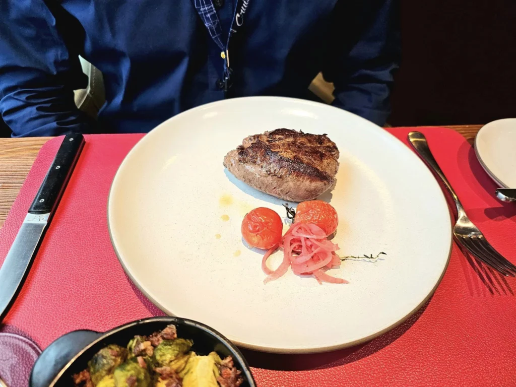 Cruising with Danny and Peter, MSC Cruises, MSC Preziosa, Zeebrugge, Brugge, Brussels, Belgium | Pictures from our Bruges day trip during the MSC Cruises Bruges excursion, showcasing the stunning Market Square Bruges, the iconic Belfry Tower Bruges, a scenic Belgium canal cruise, and beautiful views of the Chapel of the Holy Blood, along with delightful moments at the Butcher’s Cut restaurant and the MSC Voyagers Club event in the Safari Lounge MSC Preziosa.