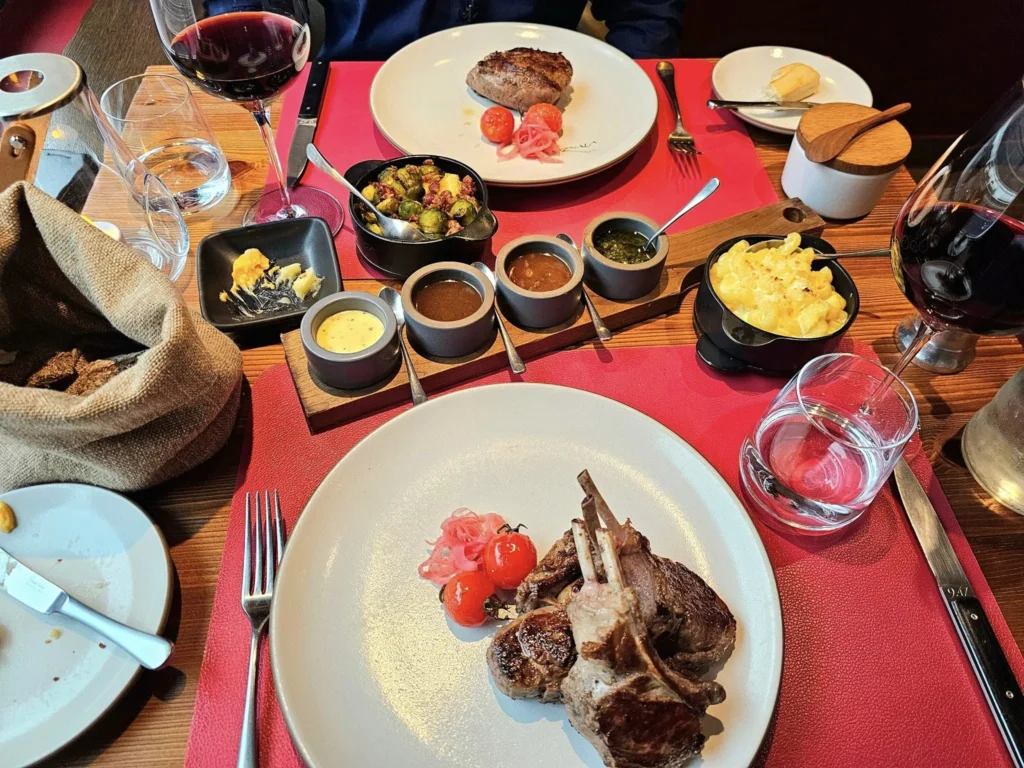 Cruising with Danny and Peter, MSC Cruises, MSC Preziosa, Zeebrugge, Brugge, Brussels, Belgium | Pictures from our Bruges day trip during the MSC Cruises Bruges excursion, showcasing the stunning Market Square Bruges, the iconic Belfry Tower Bruges, a scenic Belgium canal cruise, and beautiful views of the Chapel of the Holy Blood, along with delightful moments at the Butcher’s Cut restaurant and the MSC Voyagers Club event in the Safari Lounge MSC Preziosa.