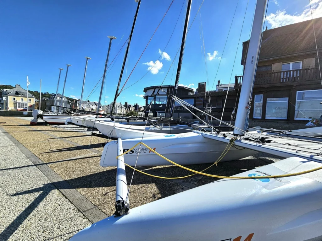 Cruising with Danny and Peter, MSC Cruises, MSC Preziosa, Le Havre, Paris, Étretat, France | Stunning views of the Étretat natural arches against the Normandy coastline, featuring the iconic L'Aiguille rock formation, picturesque half-timbered houses in Étretat, and travelers enjoying scenic walks along the cliffs during the unguided tour from MSC Preziosa.