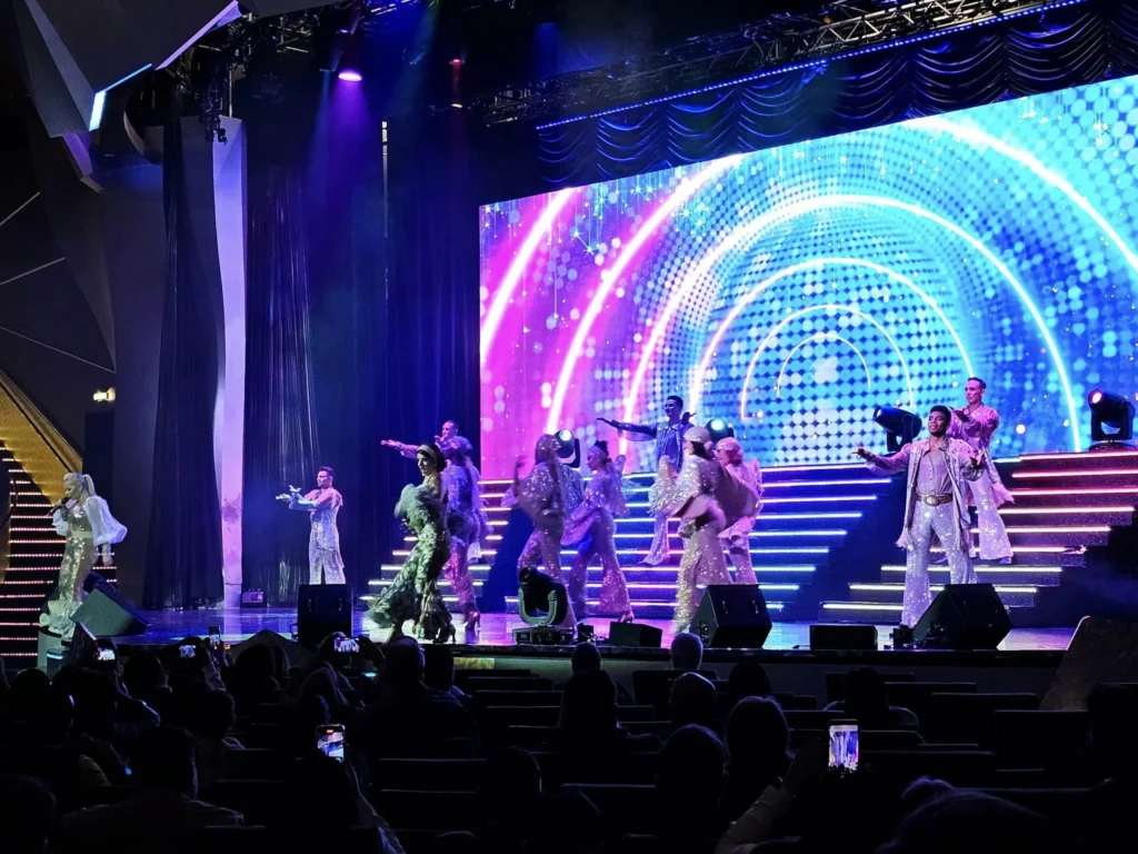 Cruising with Danny and Peter, MSC Cruises, MSC Preziosa, Le Havre, Paris, Étretat, France | Stunning views of the Étretat natural arches against the Normandy coastline, featuring the iconic L'Aiguille rock formation, picturesque half-timbered houses in Étretat, and travelers enjoying scenic walks along the cliffs during the unguided tour from MSC Preziosa.