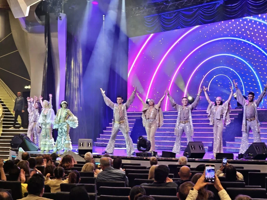 Cruising with Danny and Peter, MSC Cruises, MSC Preziosa, Le Havre, Paris, Étretat, France | Stunning views of the Étretat natural arches against the Normandy coastline, featuring the iconic L'Aiguille rock formation, picturesque half-timbered houses in Étretat, and travelers enjoying scenic walks along the cliffs during the unguided tour from MSC Preziosa.