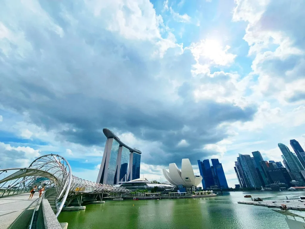 Cruising with Danny and Peter, Holland America Line, Westerdam, Singapore | View of Singapore's skyline from the Singapore Flyer during a spectacular adventure, showcasing iconic landmarks and vibrant cityscapes.