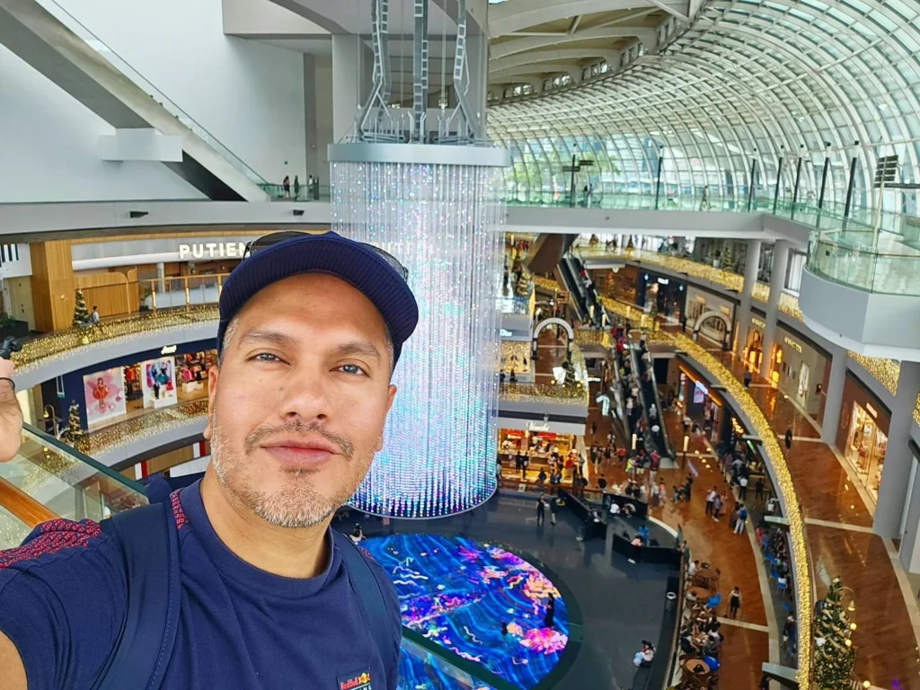 Cruising with Danny and Peter, Holland America Line, Westerdam, Singapore | View of Singapore's skyline from the Singapore Flyer during a spectacular adventure, showcasing iconic landmarks and vibrant cityscapes.