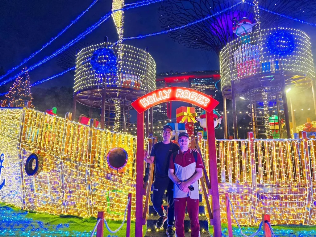 Cruising with Danny and Peter, Holland America Line, Westerdam, Singapore | View of Singapore's skyline from the Singapore Flyer during a spectacular adventure, showcasing iconic landmarks and vibrant cityscapes.